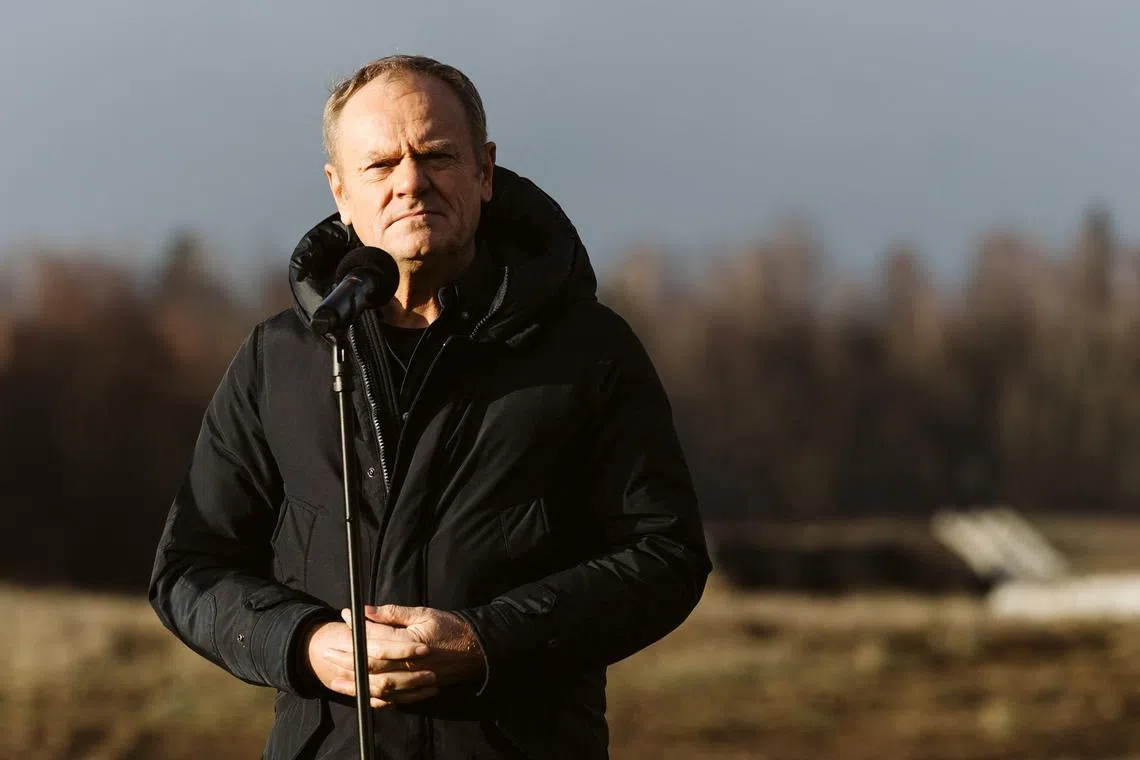 FILE PHOTO: Polish Prime Minister Donald Tusk visits the first part of a system dubbed East Shield, the construction of military fortifications along the eastern frontier of Poland, in Dabrowka, Poland November 30, 2024. Martyna Niecko/Agencja Wyborcza.pl via REUTERS/File Photo