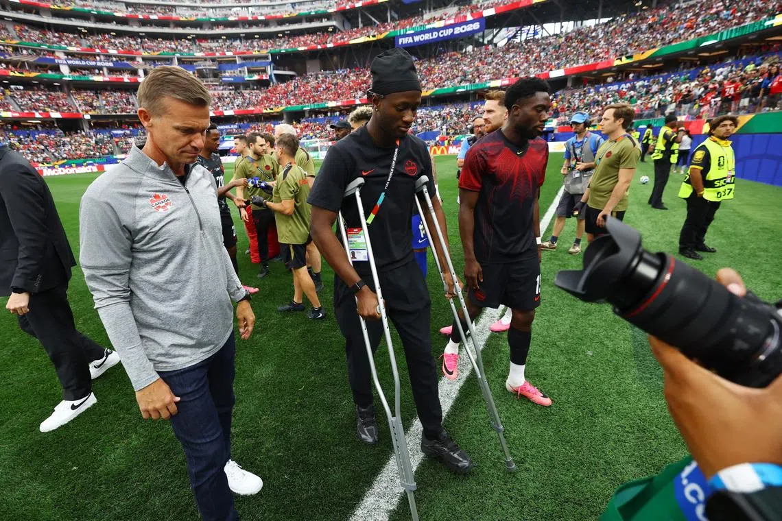 Soccer Football - FIFA World Cup 2026 - Round of 32 - South Africa v Canada - Los Angeles Stadium, Inglewood, California, U.S. - June 28, 2026 Canada's Ismael Kone walks on the pitch on crutches before the match REUTERS/Matthew Childs