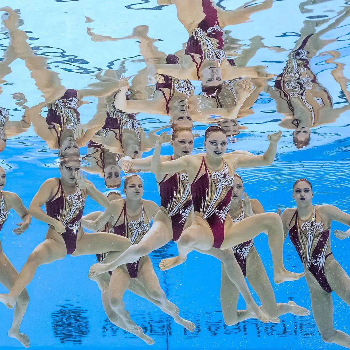 Neutral Athlete B Team competing in the final of the team technical artistic swimming event during the World Aquatics Championships in Singapore on July 22, 2025. 