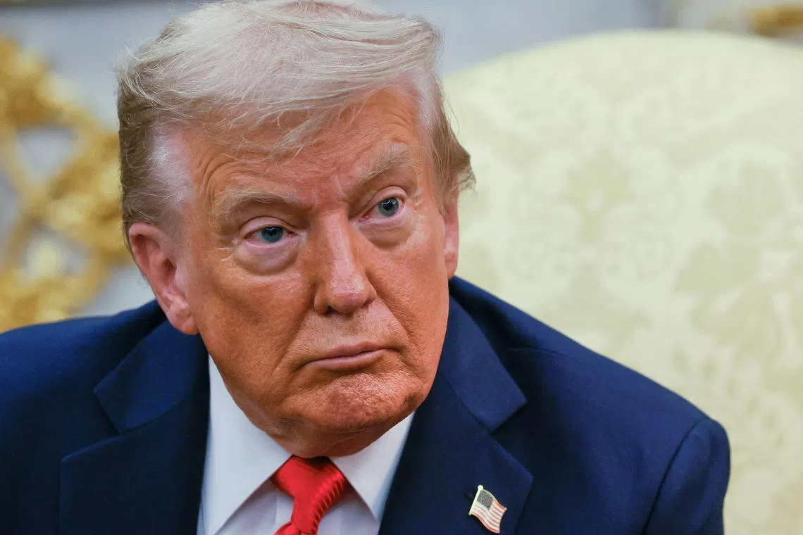 FILE PHOTO: U.S. President Donald Trump attends a meeting with South Korean President Lee Jae Myung (not pictured) at the Oval Office, at the White House, in Washington, D.C., U.S., August 25, 2025. REUTERS/Brian Snyder/File Photo