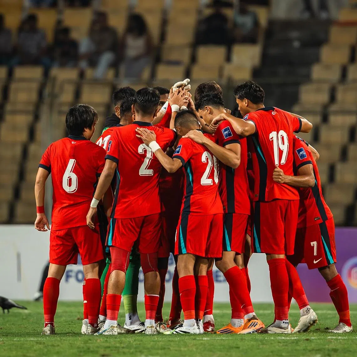 The Lions huddle during their Asian Cup qualifier against India in Goa on Oct 14. They won 2-1.