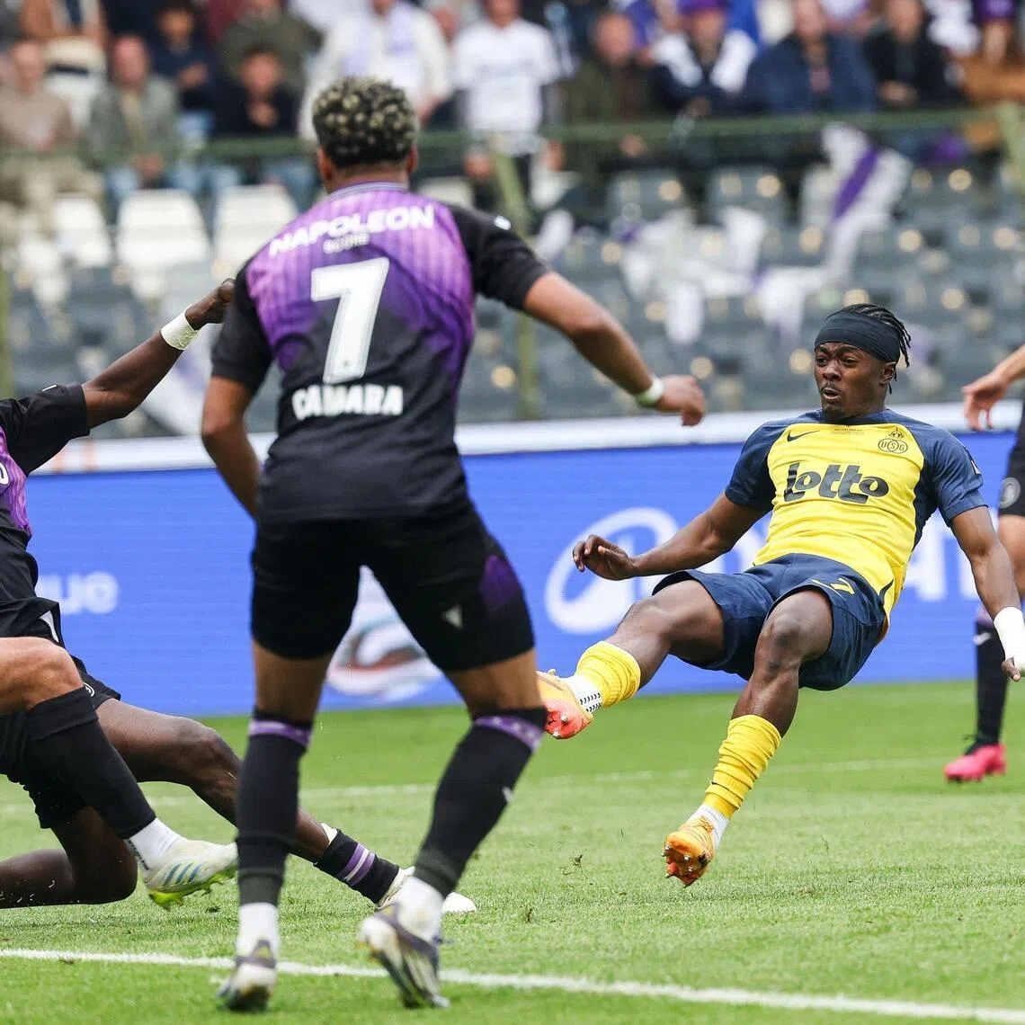 Royale Union Saint-Gilloise's Ghanaian forward Mohammed Fuseini putting them 2-1 up in extra time during the Belgian "Croky Cup" football final against RSC Anderlecht in Brussels on May 14, 2026. Union won 3-1.