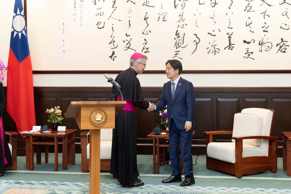 Taiwan's new President Lai Ching-te meets Archbishop Charles John Brown, the Vatican's ambassador to the Philippines, at the Presidential Office Building in Taipei, Taiwan in this handout image released May 21, 2024. Taiwan Presidential Office/Handout via REUTERS