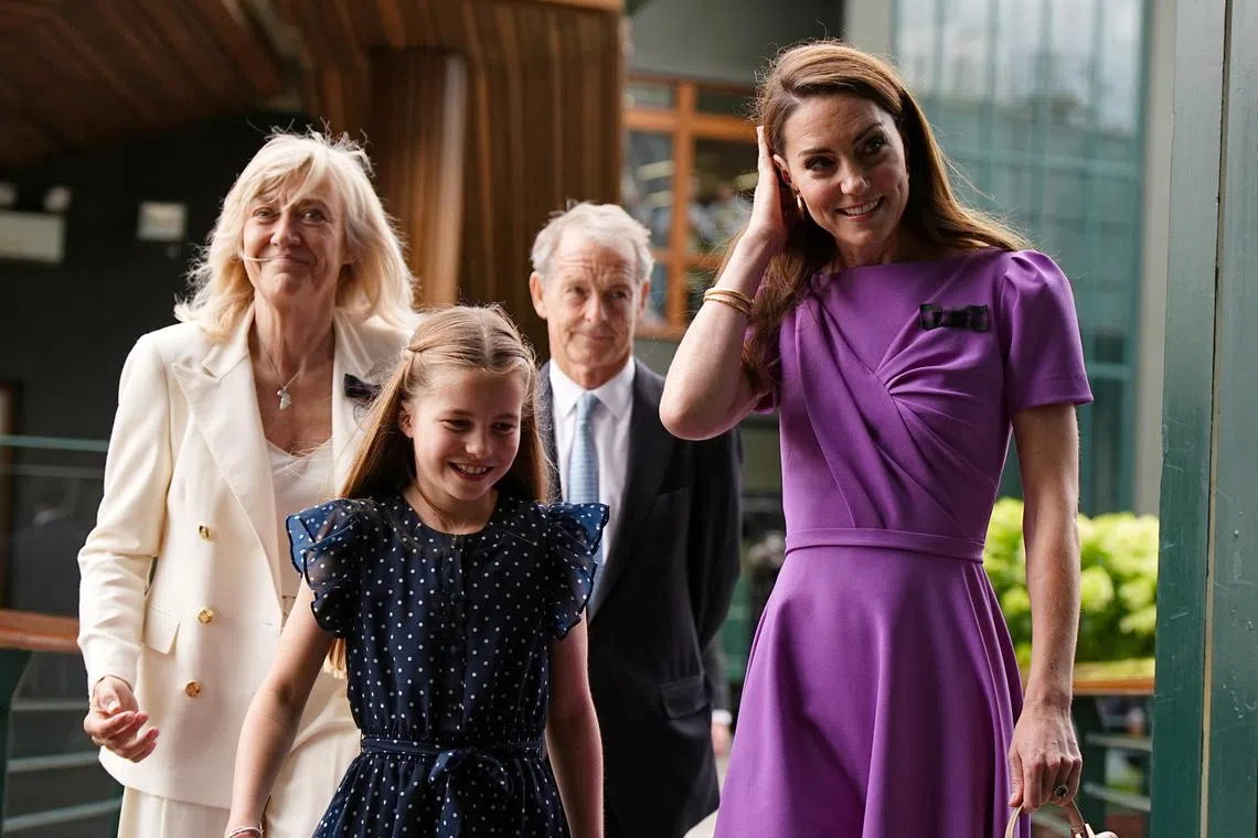 Britain's Catherine, Princess of Wales and Princess Charlotte during day fourteen of the 2024 Wimbledon Championships at the All England Lawn Tennis and Croquet Club, London, Britain, ahead of Kate presenting the trophy to the winner of the men's final. Picture date: Sunday, July 14, 2024. Aaron Chown/Pool via REUTERS
