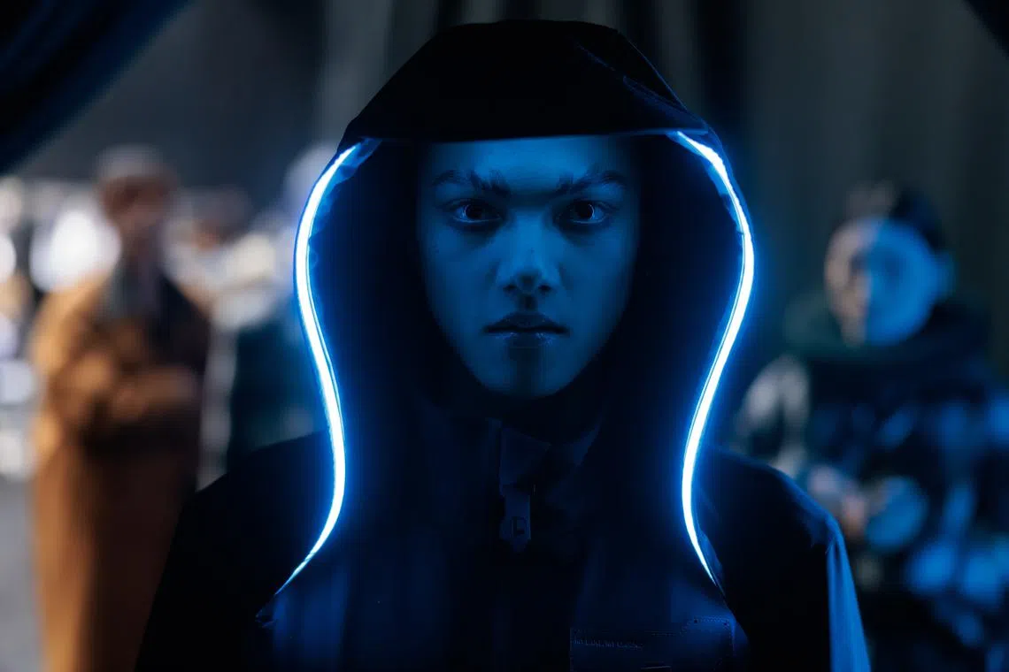 A model preparing backstage before the Staffonly runway presentation during the Shanghai Fashion Week Autumn/Winter 2023 in Shanghai, China, March 30.