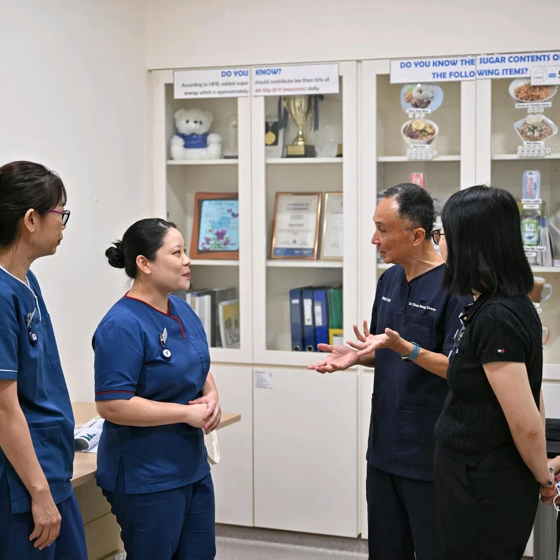 (From left) Khoo Teck Puat Hospital’s senior staff nurse Than Than, nurse clinician Tan Shu Hui, chief executive Chua Hong Choon and assistant director for operations Gennifer Lee.