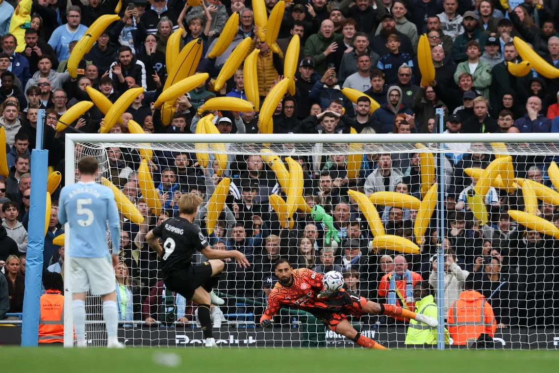 Ipswich Town’s Zian Flemming scores a penalty to make it 3-2 during the English Premier League match between Manchester City and Ipswich Town, on Oct 17.