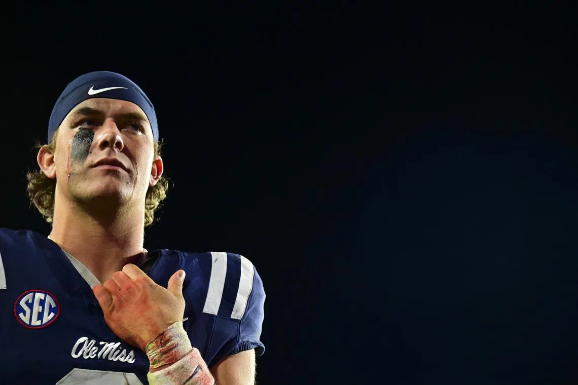 FILE PHOTO: Nov 29, 2024; Oxford, Mississippi, USA; Mississippi Rebels quarterback Jaxson Dart (2) reacts after the game against the Mississippi State Bulldogs at Vaught-Hemingway Stadium. Mandatory Credit: Matt Bush-Imagn Images/File photo