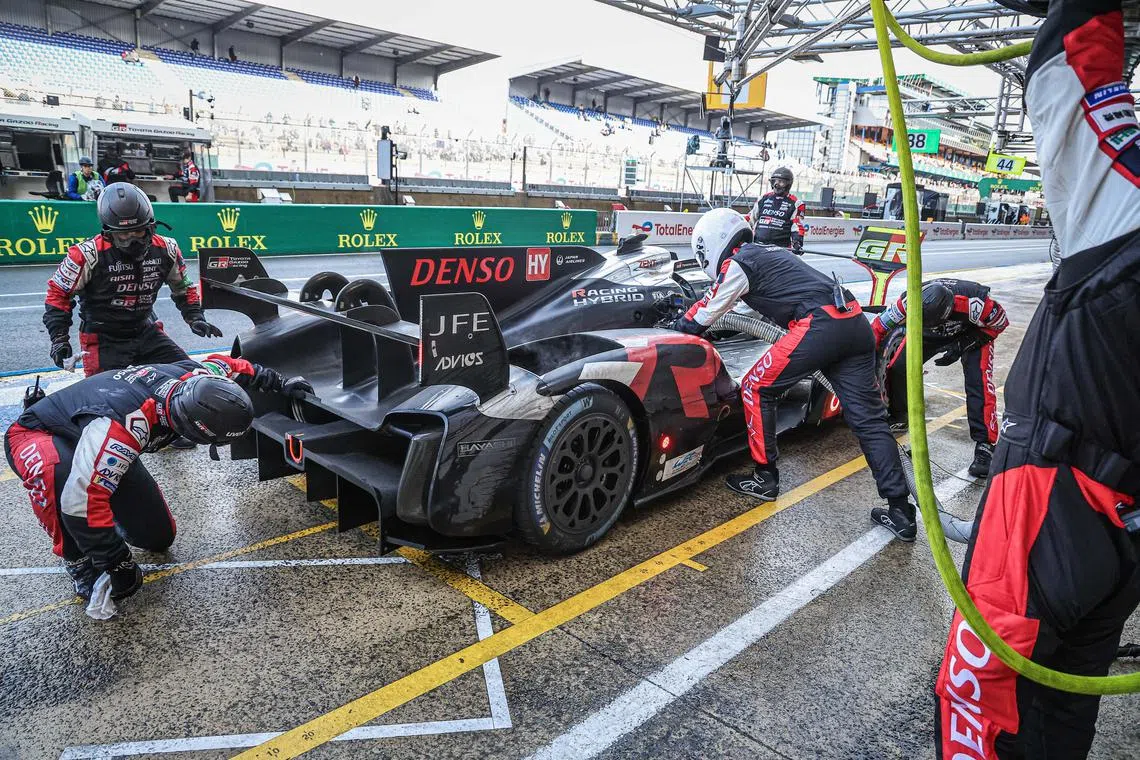 Toyota Gazoo Racing car (Starting no.08) with Sebastien Buemi of Switzerland, Brendon Hartley of New Zealand and Ryo Hirakawa of Japan at a pit stop during the 92nd edition of the 24 Hours of Le Mans race in France on June 16, 2024.