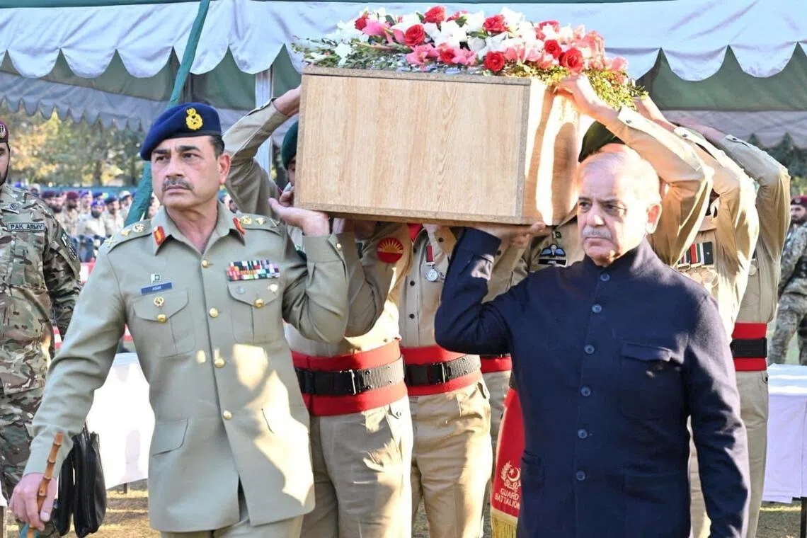 Pakistan's army chief Asim Munir and Prime Minister Shehbaz Sharif (right) in a photo taken in November 2024. The field marshal is widely seen as the nation's most powerful leader.