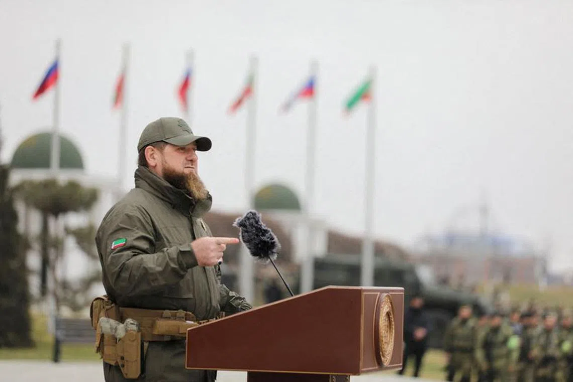 Head of the Chechen Republic Ramzan Kadyrov addresses service members while making a statement, dedicated to a military conflict in Ukraine, in Grozny, Russia February 25, 2022. REUTERS/Chingis Kondarov/File Photo
