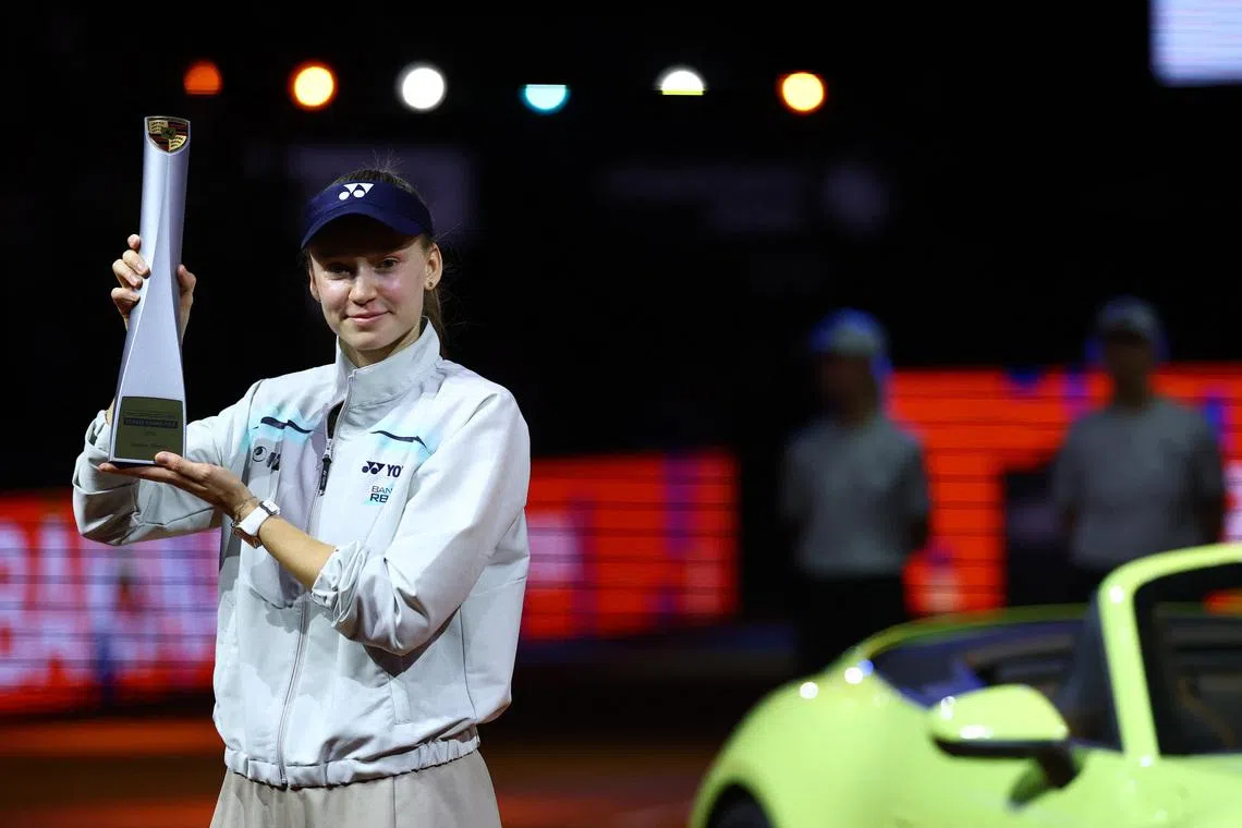 Tennis - WTA 500 - Stuttgart Open - Porsche-Arena, Stuttgart, Germany - April 19, 2026 Kazakhstan's Elena Rybakina celebrates with the trophy after winning her women's singles final against Czech Republic's Karolina Muchova REUTERS/Kai Pfaffenbach