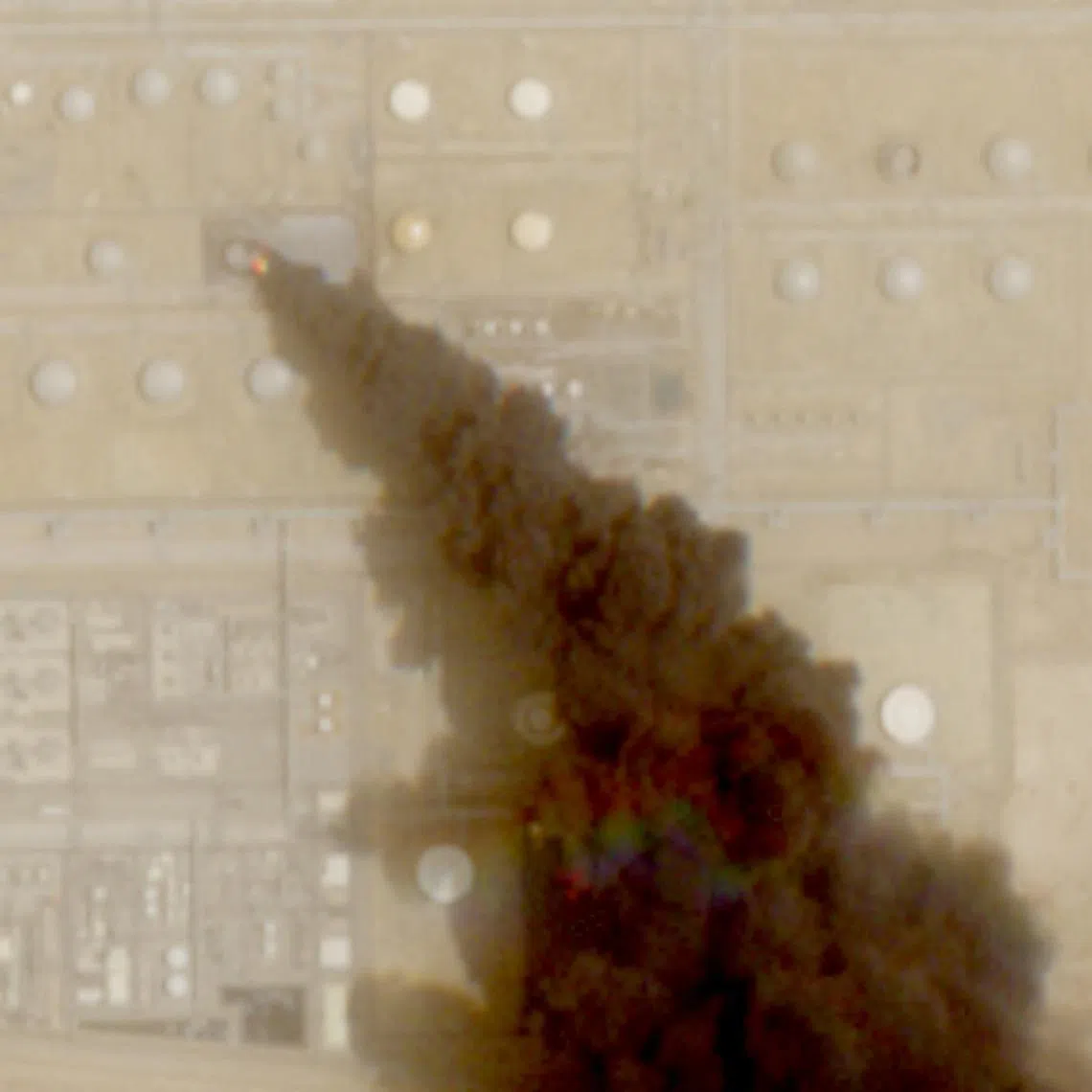 A satellite image shows trail of smoke rising from an oil facility in Saudi Arabia on July 26, a day after Yemen’s Iran-aligned Houthis said that they carried out operations targeting Saudi Aramco facilities in Jizan and Yanbu.