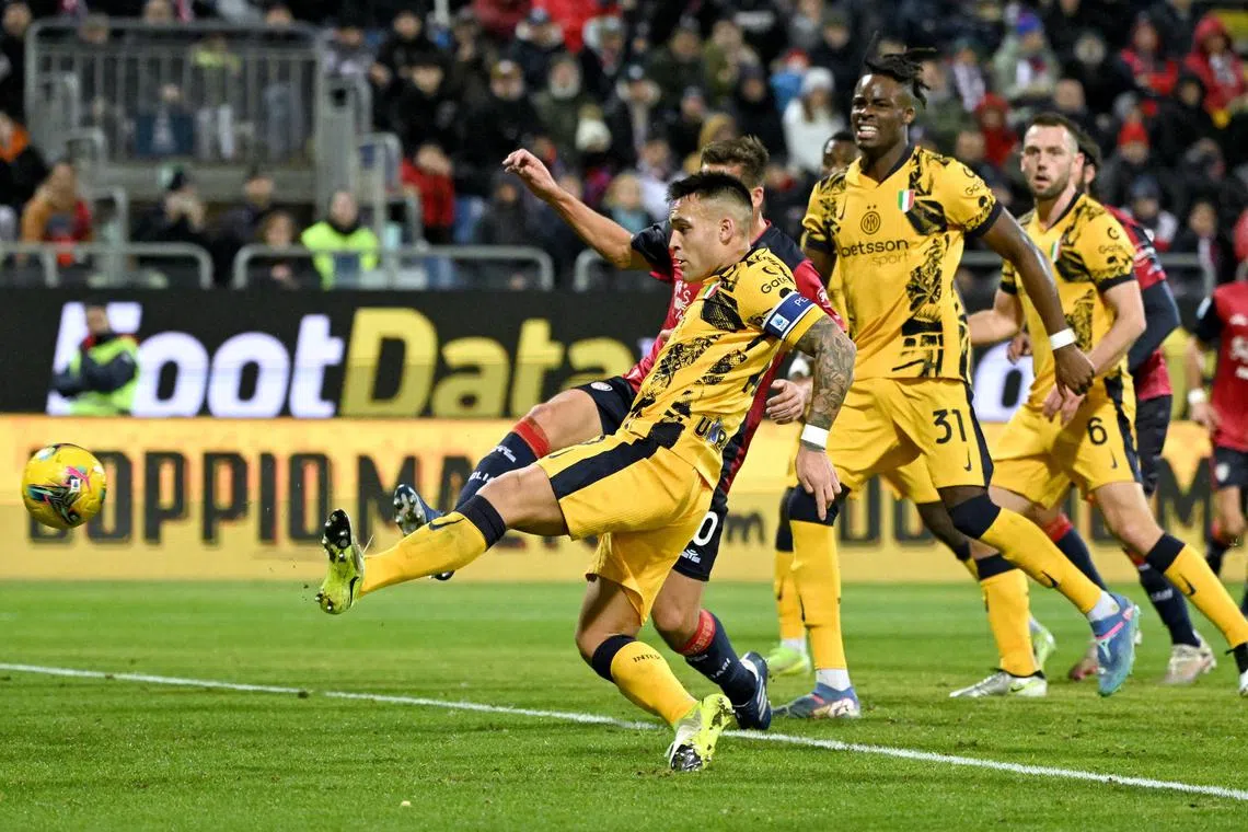 Soccer Football - Serie A - Cagliari v Inter Milan - Unipol Domus, Cagliari, Italy - December 28, 2024
Inter Milan's Lautaro Martinez scoring their second goal in a CAGLIARI – Inter Milan coach Simone Inzaghi reaffirmed his faith in striker Lautaro Martinez after he ended his goal drought in the 