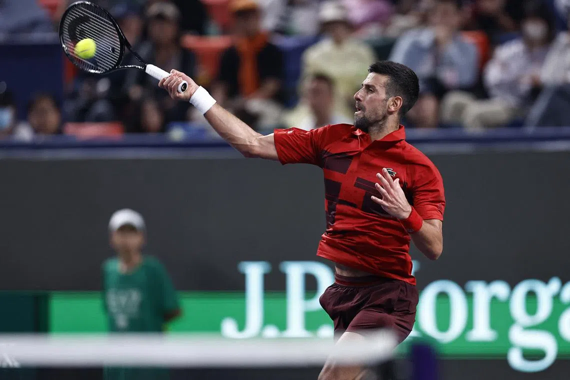Tennis - Shanghai Masters - Qizhong Forest Sports City Arena, Shanghai, China - October 11, 2024 Serbia's Novak Djokovic in action during his quarter final match against Czech Republic's Jakub Mensik REUTERS/Tingshu Wang