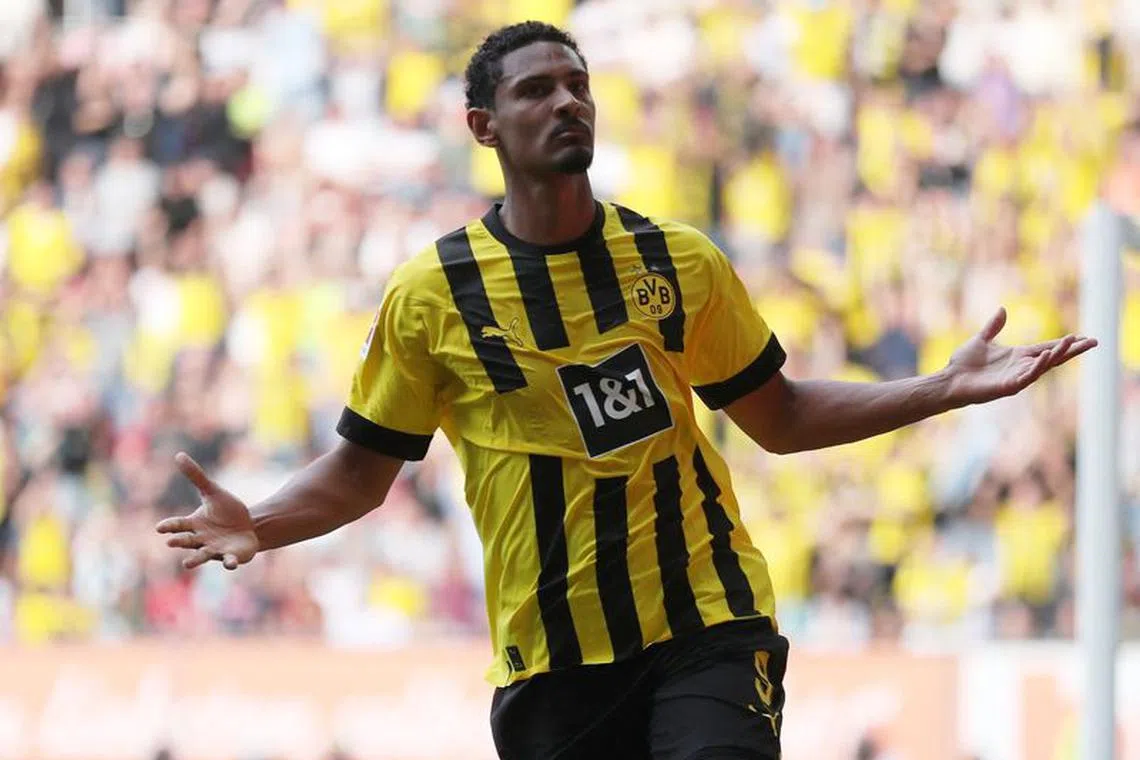 Soccer Football - Bundesliga - FC Augsburg v Borussia Dortmund - WWK Arena, Augsburg, Germany - May 21, 2023 Borussia Dortmund's Sebastien Haller celebrates scoring their first goal REUTERS/Leonhard Simon/File Photo