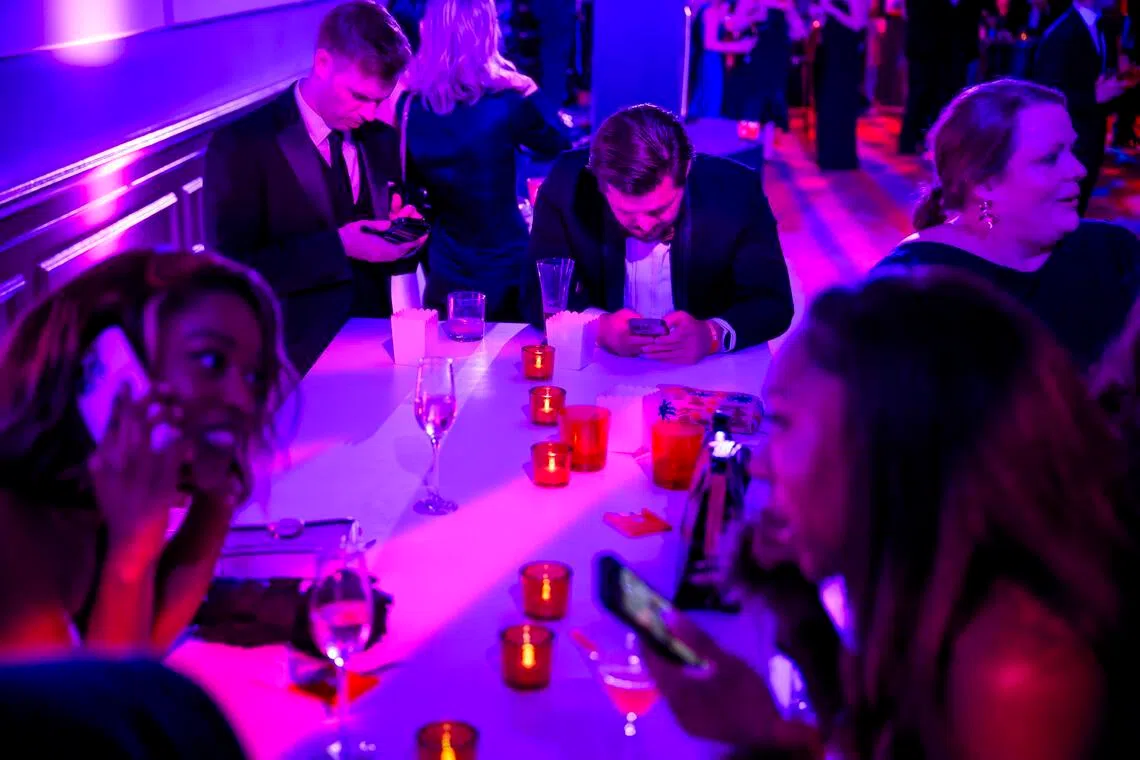 Guests at a party hosted by the newsletter platform Substack reacting to news of gunfire at the White House Correspondents Association dinner on April 25, 2026.