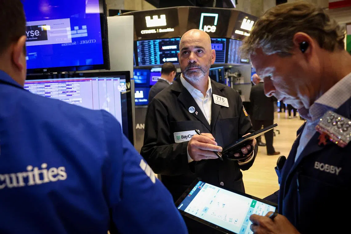 Traders working on the floor of the New York Stock Exchange, in New York City, on May 13.