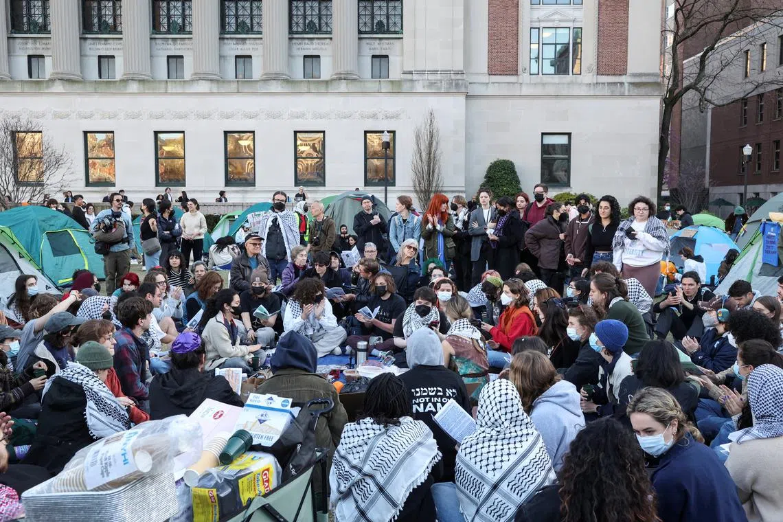 FILE PHOTO: A collective of groups organised by Jewish students at Columbia and Barnard in solidarity with Gaza and the protest encampment host Passover Seder at Columbia University, during the ongoing conflict between Israel and the Palestinian Islamist group Hamas, in New York City, U.S., April 22, 2024, REUTERS/Caitlin Ochs/File Photo