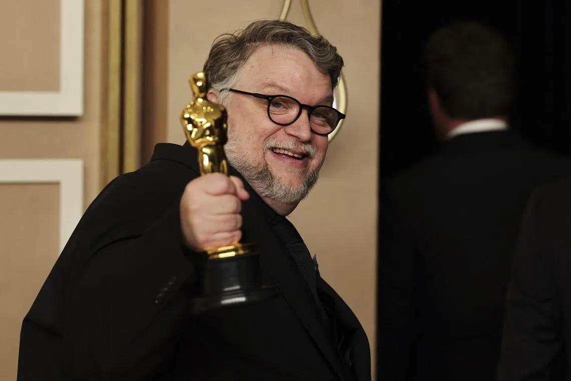 Guillermo del Toro celebrates with the Oscar for Best Animated Feature Film for Guillermo Del Toro's Pinocchio in the Oscars photo room at the 95th Academy Awards in Hollywood, Los Angeles on March 12, 2023.  