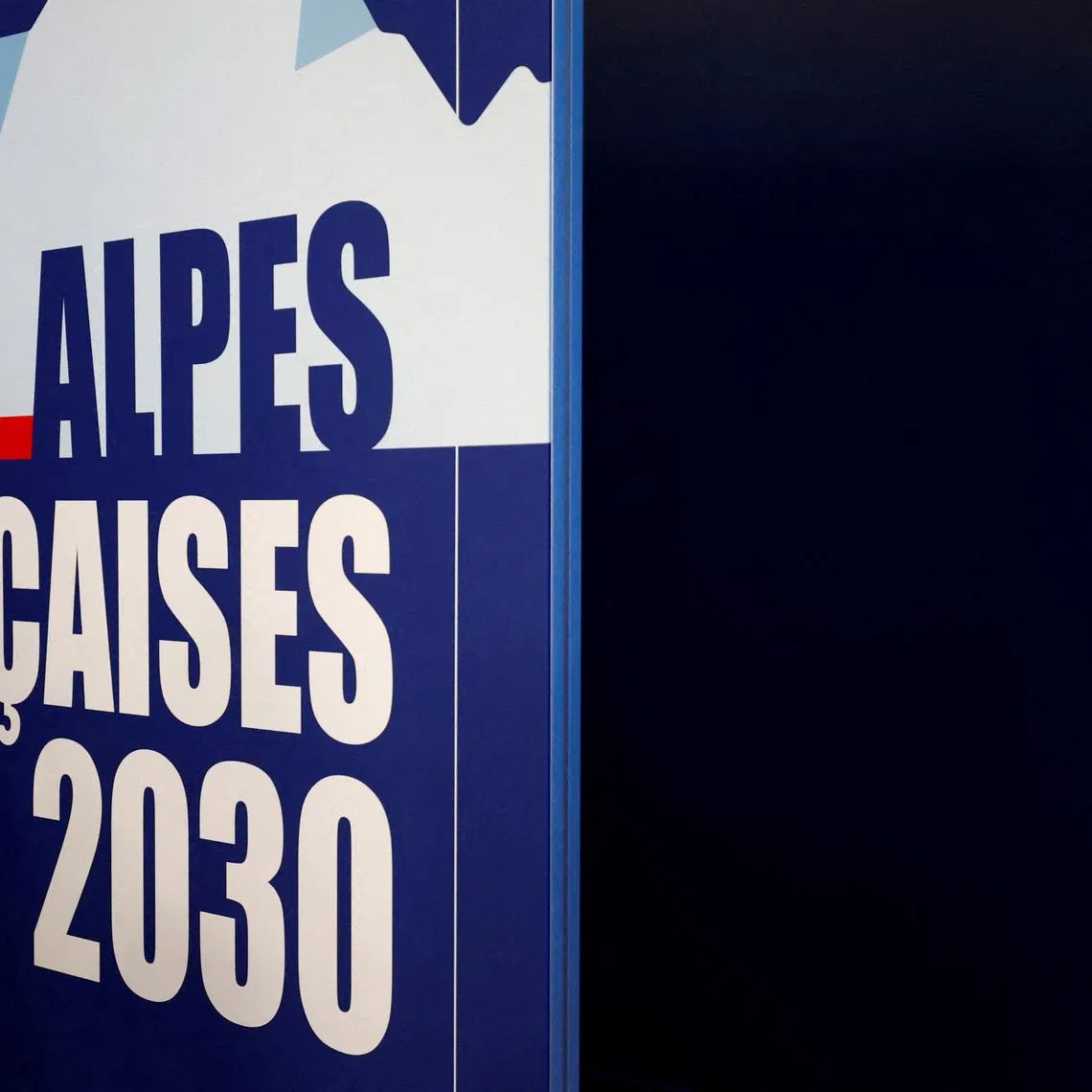 FILE PHOTO: The logo of \"French Alps 2030\" at the press conference of the launch of the Organizing Commitee for the 2030 French Alps Olympic and Paralympic Winter Games in Lyon, France, February 18, 2025. REUTERS/Manon Cruz/File Photo