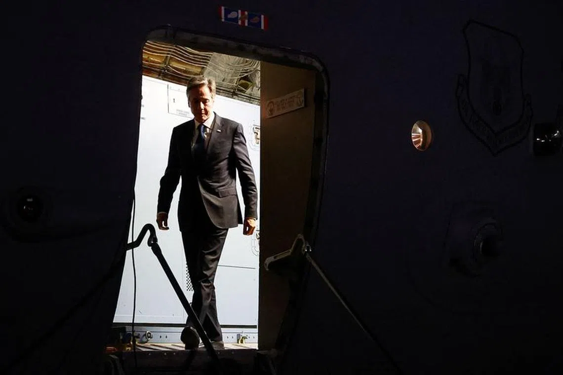 U.S. Secretary of State Antony Blinken disembarks at the airport after arriving from Israel, amid the ongoing conflict between Israel and the Palestinian Islamist group Hamas, in Amman, Jordan November 3, 2023. REUTERS/Jonathan Ernst/Pool