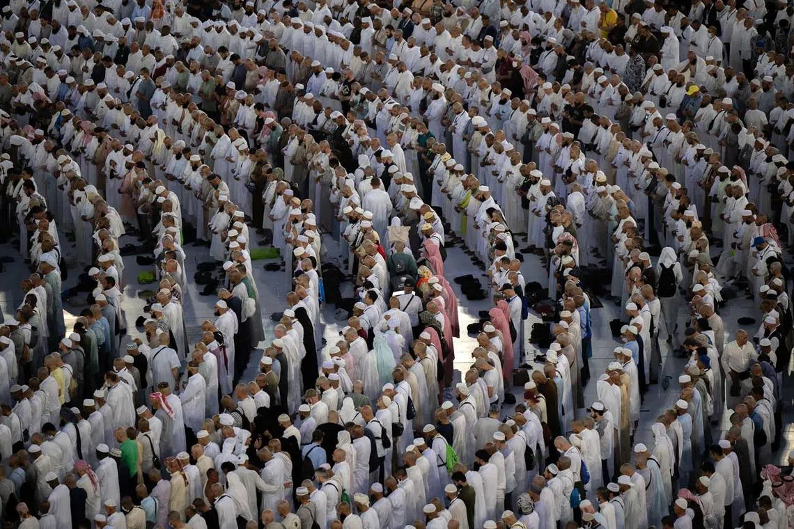 TOPSHOT - In this handout picture provided by the Saudi Press Agency (SPA) on June 29, 2023, Muslim pilgrims gather around the Kaaba, Islam's holiest shrine, at the Grand Mosque in the holy city of Mecca, on the second day of Eid Al-Adha that ends the Hajj pilgrimage. (Photo by SPA / SPA / AFP) / === RESTRICTED TO EDITORIAL USE - MANDATORY CREDIT "AFP PHOTO / HO / SPA" - NO MARKETING NO ADVERTISING CAMPAIGNS - DISTRIBUTED AS A SERVICE TO CLIENTS ===
