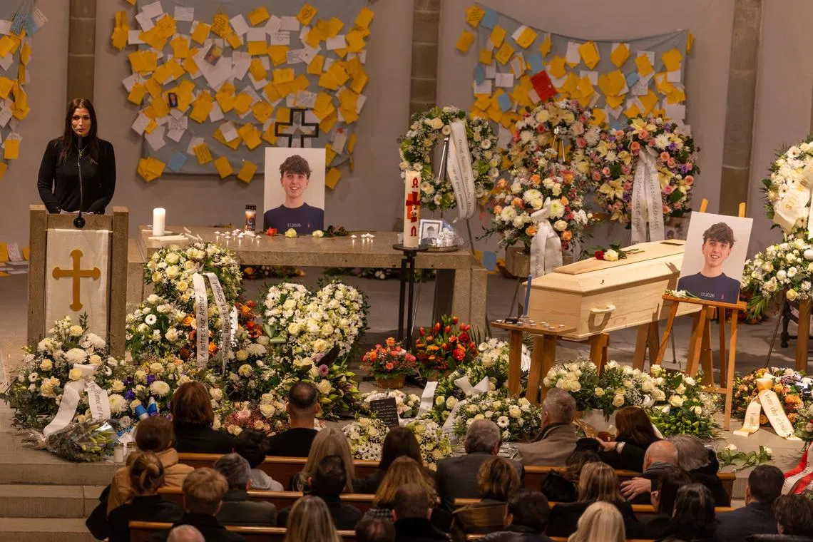 Teen soccer player who died in Swiss bar fire laid to rest