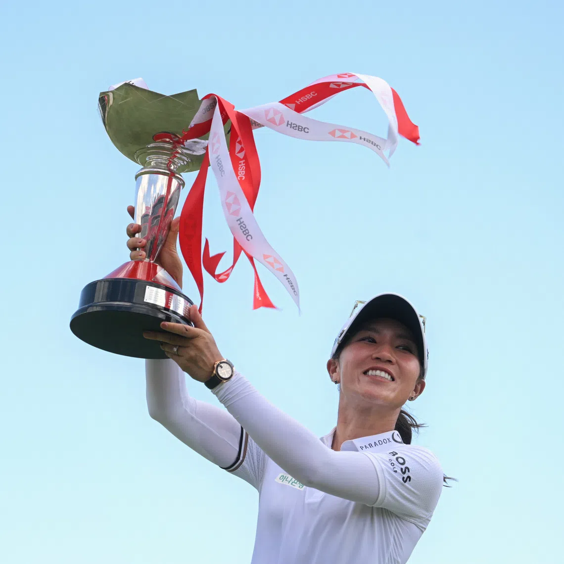Lydia Ko of New Zealand poses with her trophy at the 18th hole after winning the HSBC Women's World Championship at the Tanjong Golf Course on March 2, 2025.