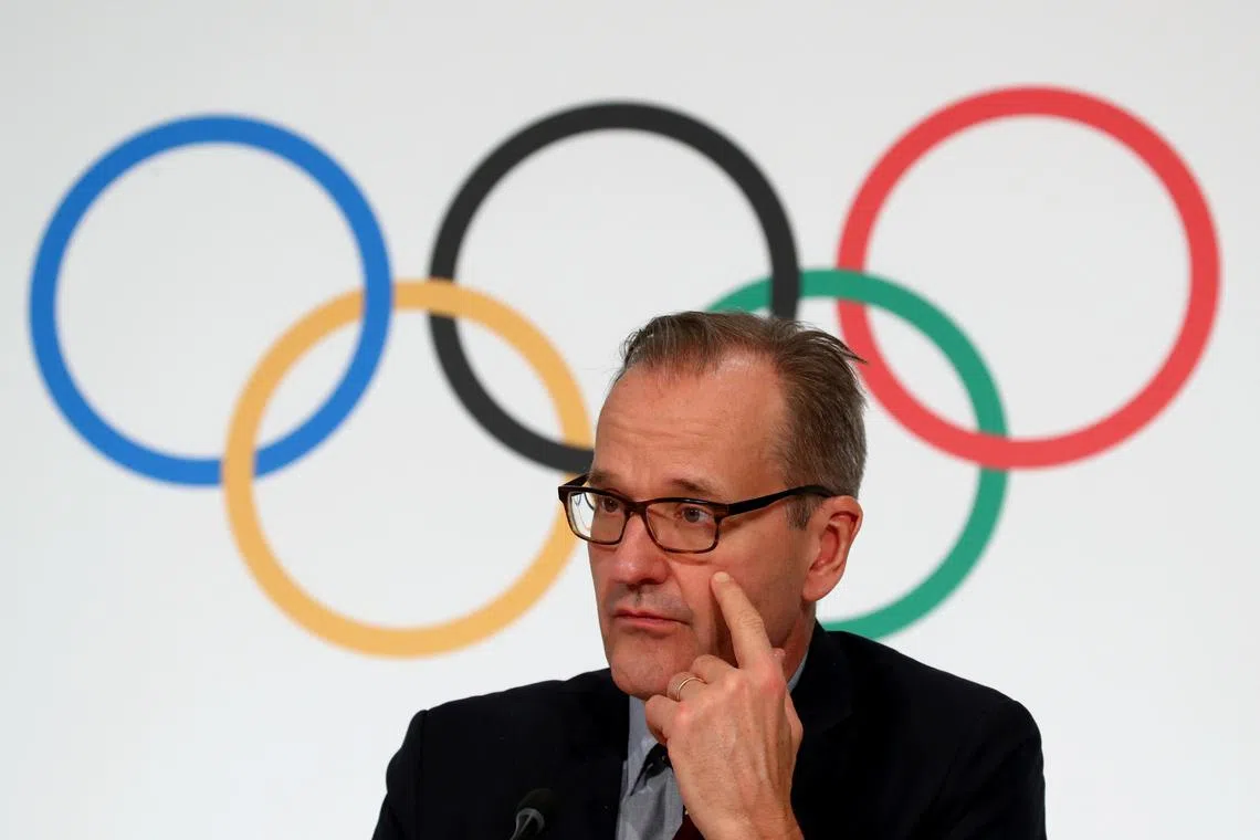 FILE PHOTO: Mark Adams Director of Communications at the International Olympic Committee (IOC) attends a news conference in Lausanne, Switzerland, December 5, 2019. Picture taken December 5, 2019.  REUTERS/Denis Balibouse/File Photo