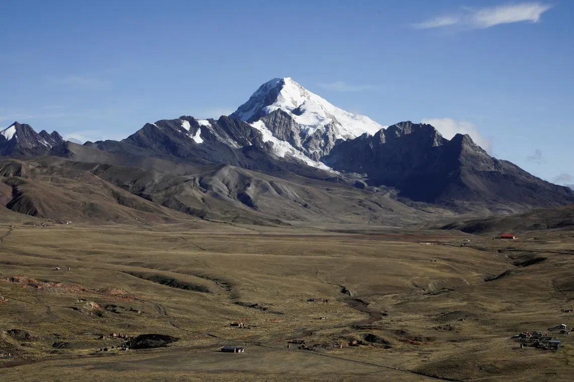 FILE PHOTO: The Huayna Potosi mountain is seen without its glaciers and with little snow, in Milluni, near El Alto outskirts of La Paz, Bolivia, December 21, 2020. Picture taken December 21, 2020. REUTERS/David Mercado