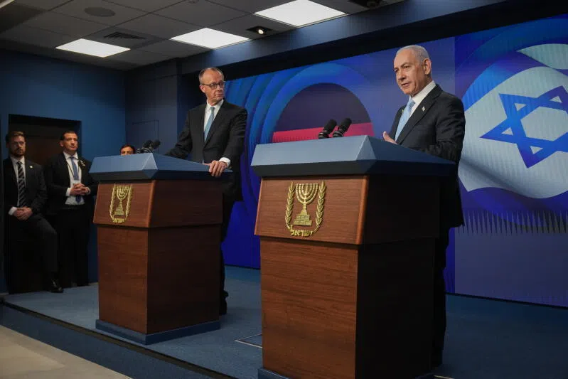 German Chancellor Friedrich Merz (left) and Israeli Prime Minister Benjamin Netanyahu addressing a joint press conference in Jerusalem on Dec 7.
