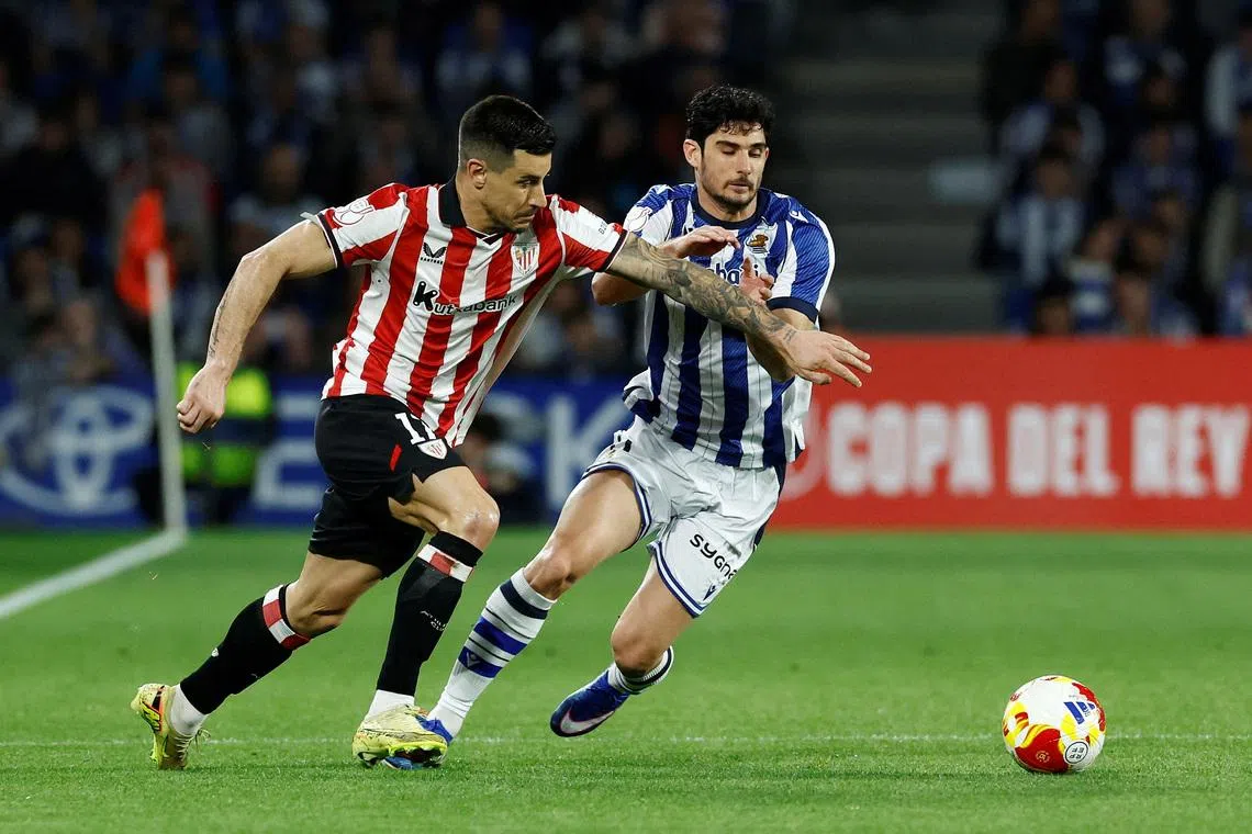 FILE PHOTO: Soccer Football - Copa del Rey - Semi Final - Second Leg - Real Sociedad v Athletic Bilbao - Reale Arena, San Sebastian, Spain - March 4, 2026 Athletic Bilbao's Yuri Berchiche in action with Real Sociedad's Goncalo Guedes REUTERS/Vincent West/File Photo