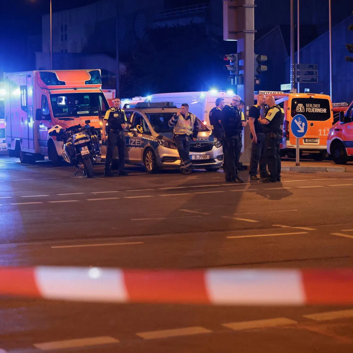 Emergency responders operate at the site, after the annual Berlin's Christopher Street Day Pride parade was called off, after a car crashed into the crowd at Tiergarten park, leaving several people injured, in Berlin, Germany, July 26, 2026.  REUTERS/Christian Mang