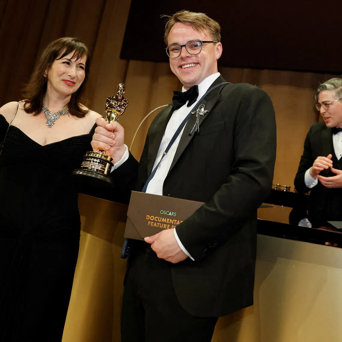 FILE PHOTO: Pavel Talankin, winner of the Oscar for Best Documentary Feature Film for \"Mr. Nobody Against Putin\", poses at the Governors Ball following the Oscars show at the 98th Academy Awards in Hollywood, Los Angeles, California, U.S., March 15, 2026. REUTERS/Carlos Barria/File Photo