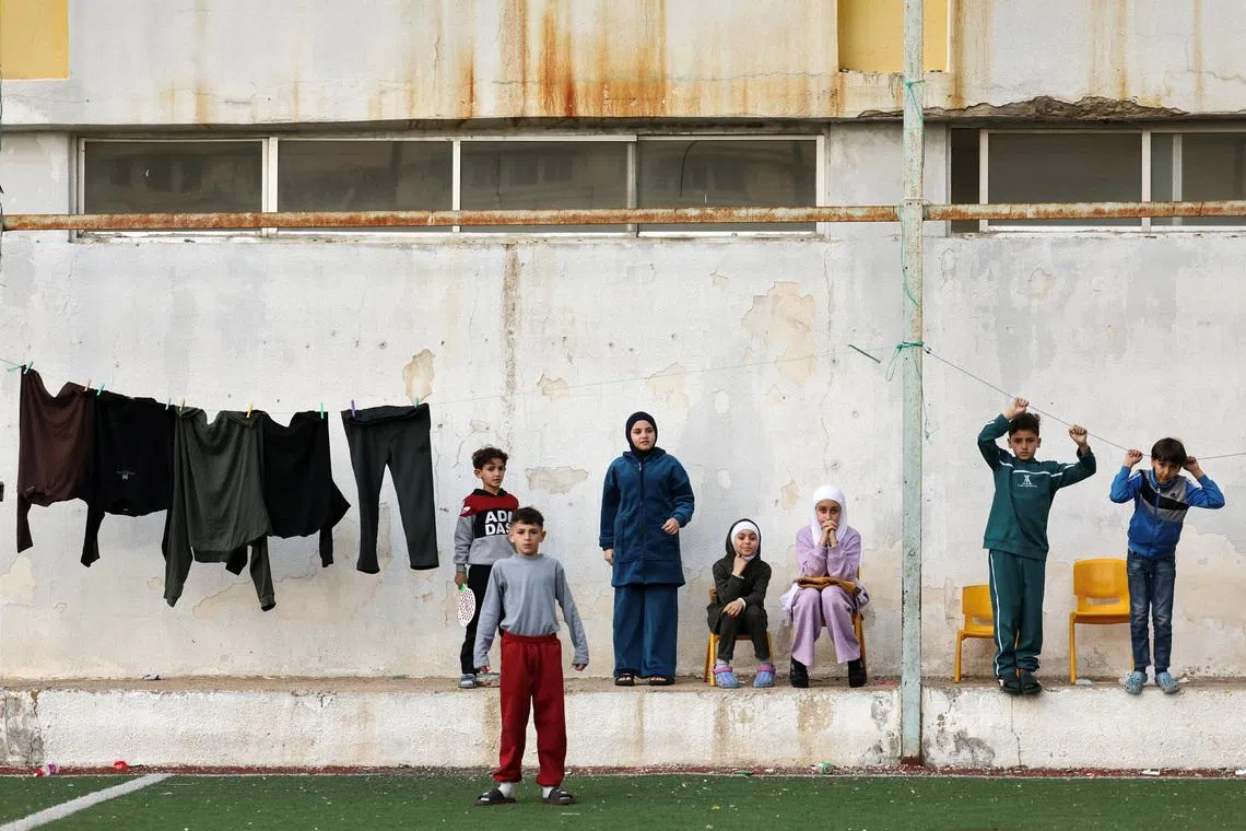 Displaced mothers in Lebanon welcome babies' new lives with hope and fear