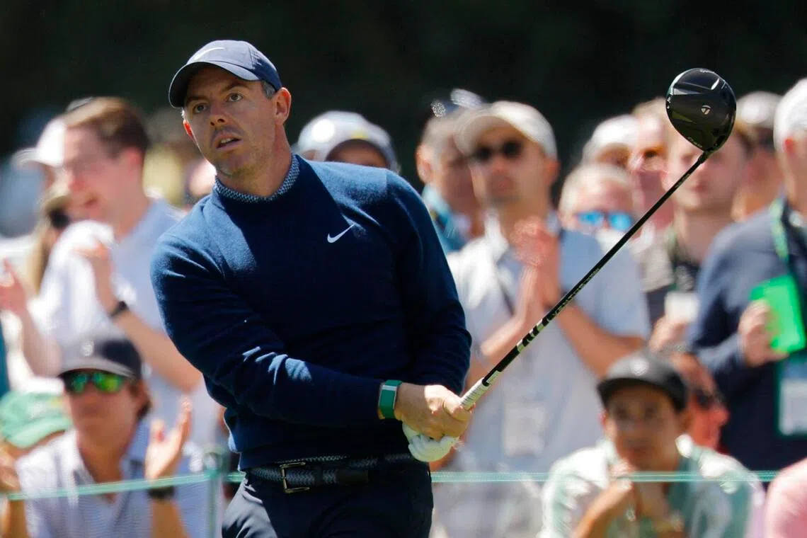 Northern Ireland's Rory McIlroy watches his tee shot on the 17th hole, during the first round of the Masters.