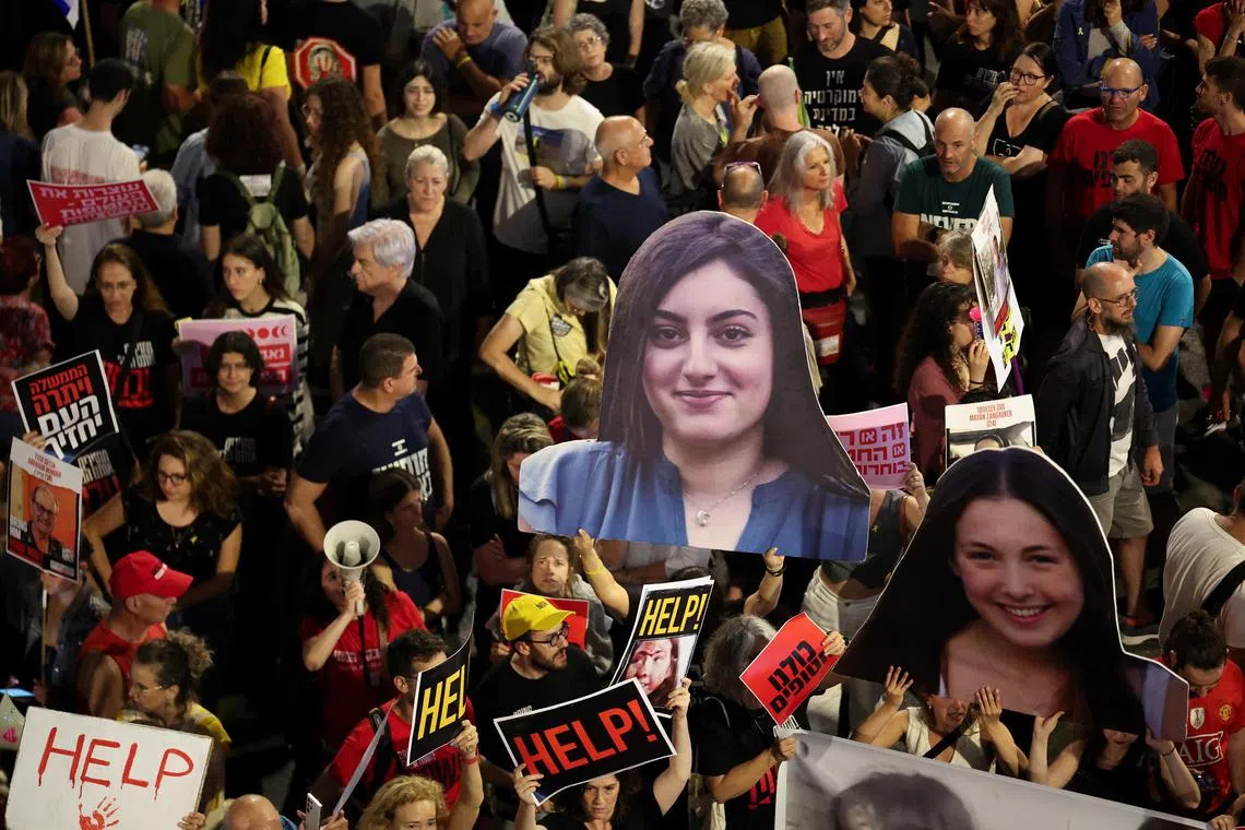 People attending a protest against Israeli Prime Minister Benjamin Netanyahu's government, in Tel Aviv, on May 25.