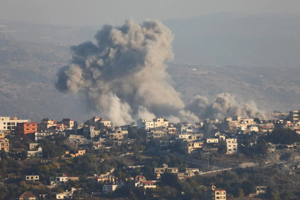 Smoke billows over Khiam, amid ongoing hostilities between Hezbollah and Israeli forces, as pictured from Marjayoun, near the border with Israel, October 29, 2024. REUTERS/Karamallah Daher/File Photo