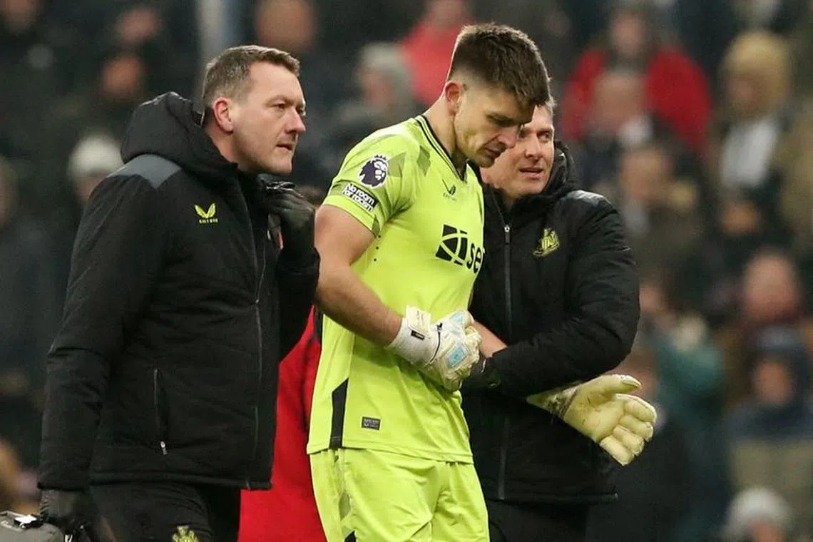 Soccer Football - Premier League - Newcastle United v Manchester United - St James' Park, Newcastle, Britain - December 2, 2023 Newcastle United's Nick Pope is substituted after sustaining an injury Action Images via Reuters/Scott Heppell/File Photo