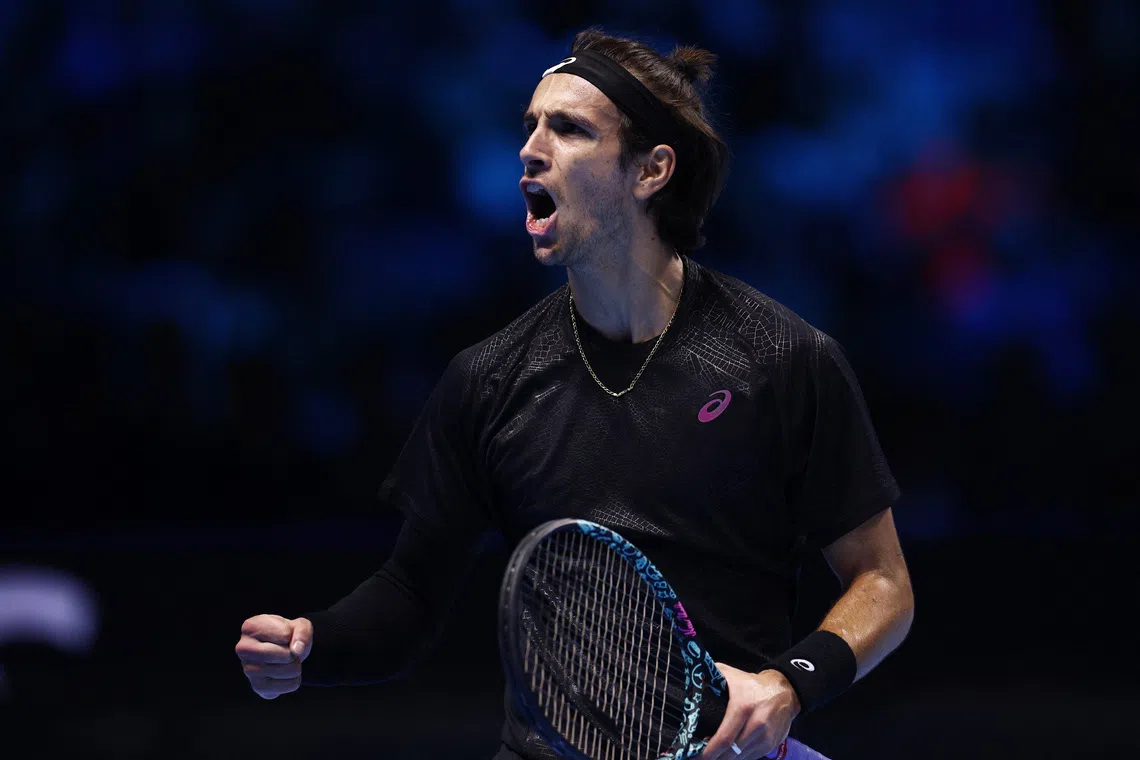Tennis - ATP Finals - Turin - Palasport Olimpico, Turin, Italy - November 11, 2025 Italy's Lorenzo Musetti reacts during his group stage match against Australia's Alex De Minaur REUTERS/Guglielmo Mangiapane