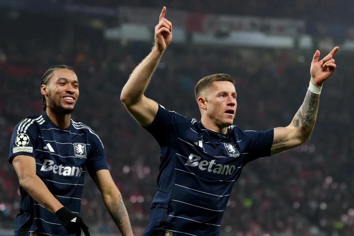 Aston Villa's Ross Barkley (right) celebrates after scoring his team's third, winning goal.