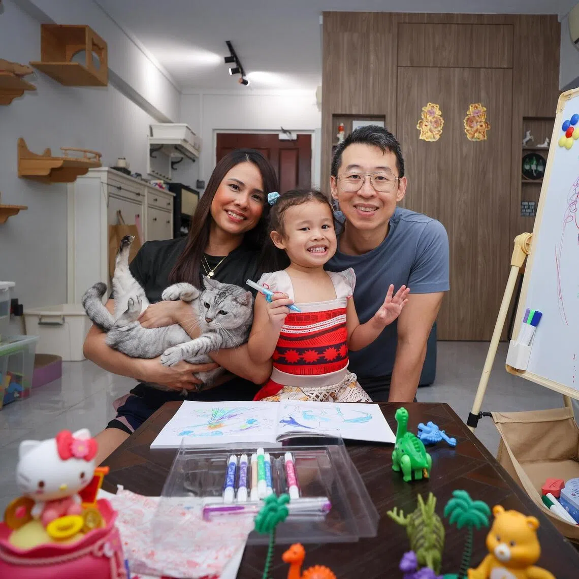 ST20260313_202601400443/sftfr15/Soo Fang/Jason Quah

Andre Tong, Rachael Chen their daughter Katie Meyer Tong and pet cat Kouki pictured Mar 13, 2026. ST PHOTO: JASON QUAH