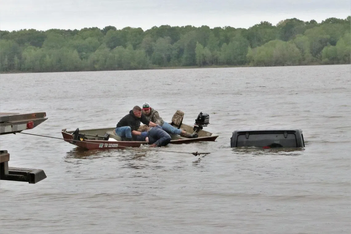 Photos shared by the Sherriff’s Office showed most of the jeep was submerged, with only its black roof visible. 