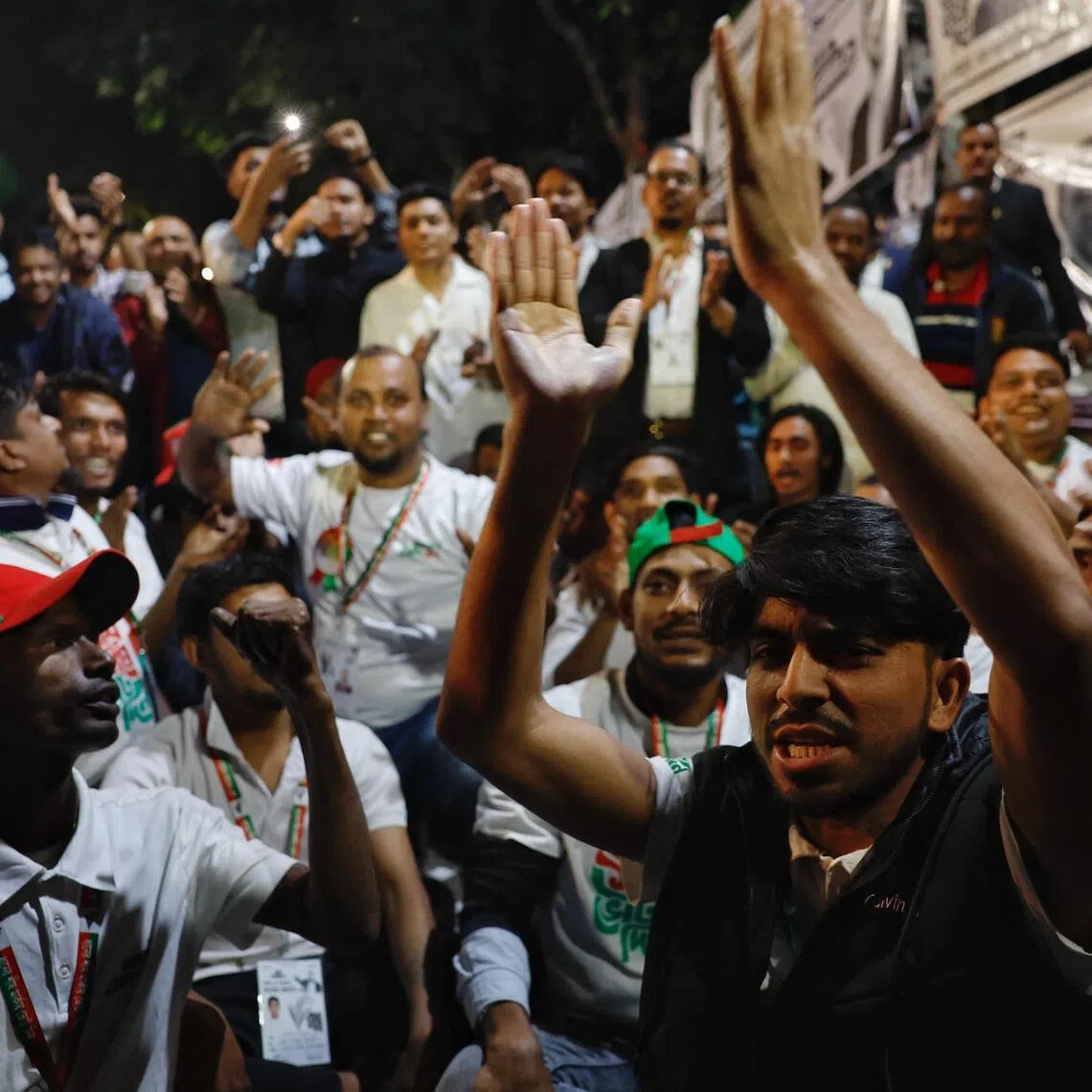Supporters of the Bangladesh Nationalist Party chanting slogans as they celebrate unofficial news of Mr Tarique Rahman's win in his constituency, on Feb 12 in Dhaka.