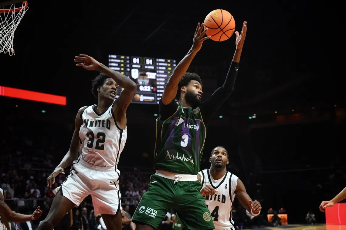 James Webb III (centre) of Unicaja winning the rebound against NBA G League United players in the final of the FIBA Intercontinental Cup Singapore 2025 on Sept 21.