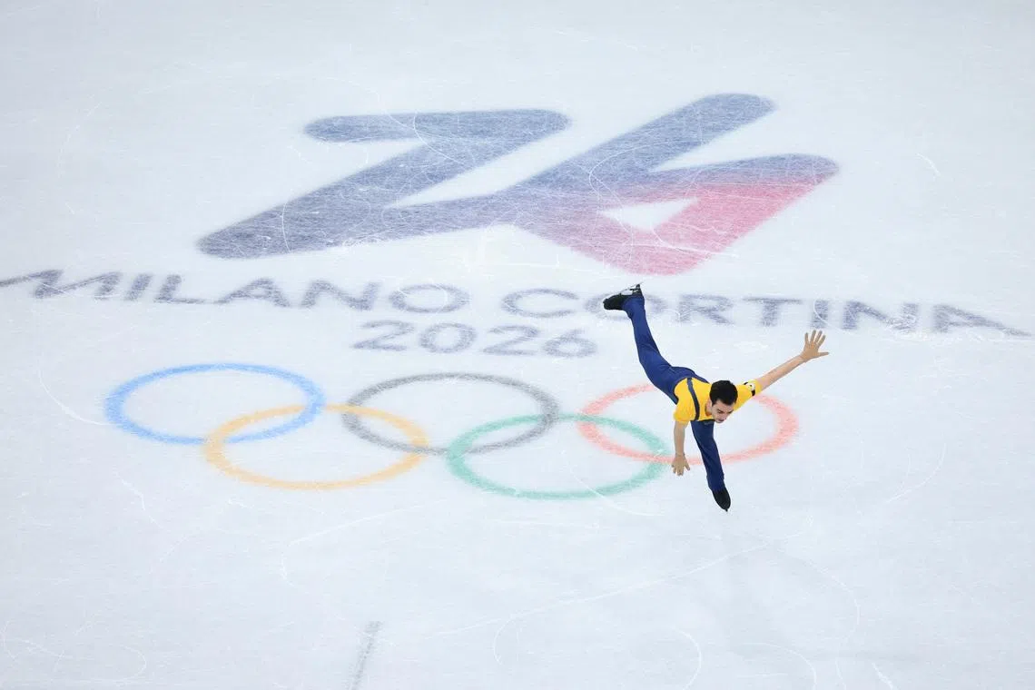 Feb 10, 2026; Milan, Italy; Tomas Guarino Sabate of Spain competes in men's singles short program during the Milano Cortina 2026 Olympic Winter Games at Milano Ice Skating Arena. Mandatory Credit: Katie Stratman-Imagn Images