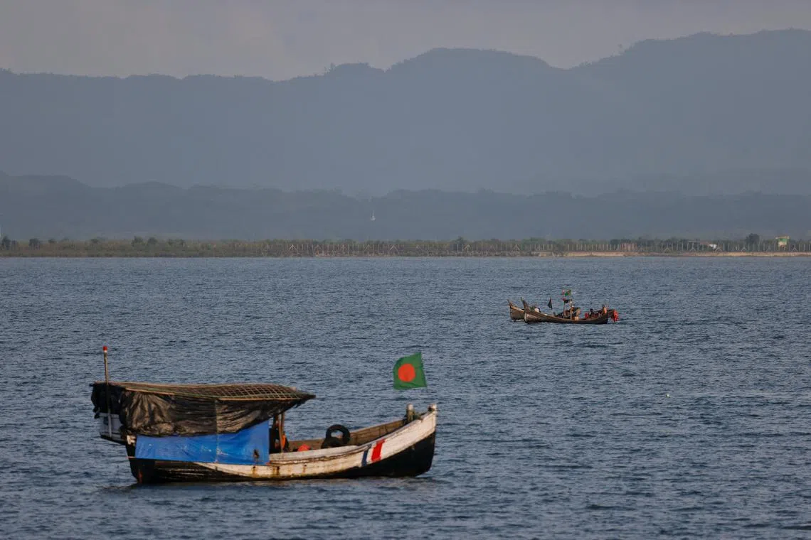 Boats in the Naf River, at the Myanmar-Bangladesh border, during the ongoing conflict in the Rakhine state of Myanmar, in Cox's Bazar, Bangladesh, on Sept 26.