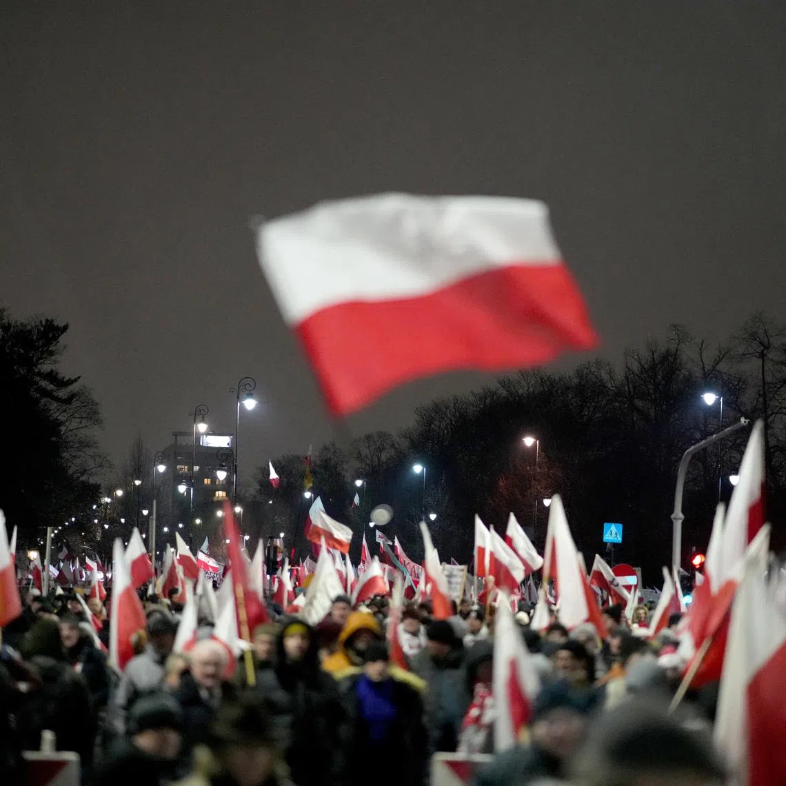 FILE PHOTO: Supporters of the Law and Justice (PiS) party gather in protest against state media overhaul and arrest of former interior minister and his deputy in Warsaw, January 11, 2024. REUTERS/Aleksandra Szmigiel/File Photo