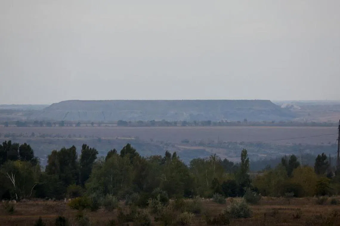 A view shows the area of Avdiivka town in the course of Russia-Ukraine conflict, as seen from Yasynuvata (Yasinovataya) in the Donetsk region, Russian-controlled Ukraine, October 13, 2023. REUTERS/Alexander Ermochenko